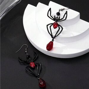 Gothic Earrings Black Widow Spider, Dangling with sparkling Red Ruby lig…